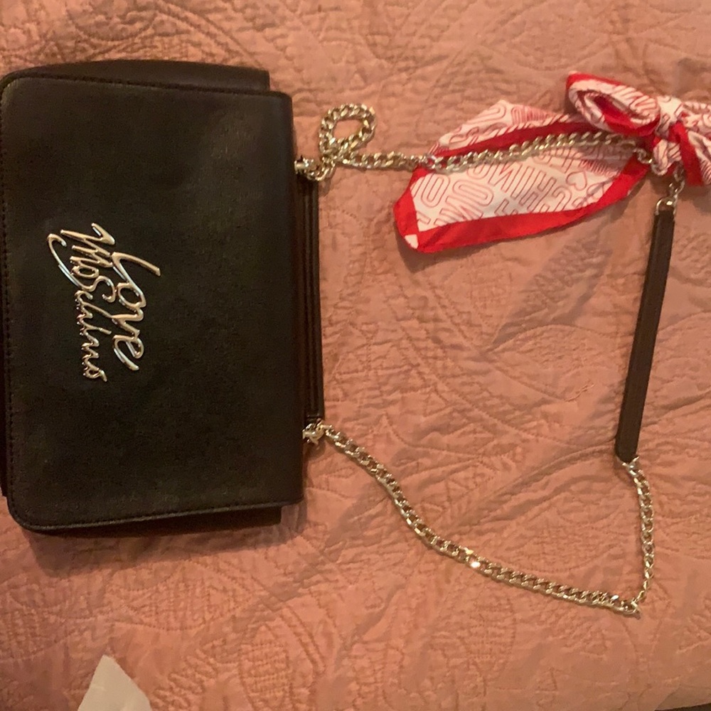 Love Moschino bag with scarf on straps.